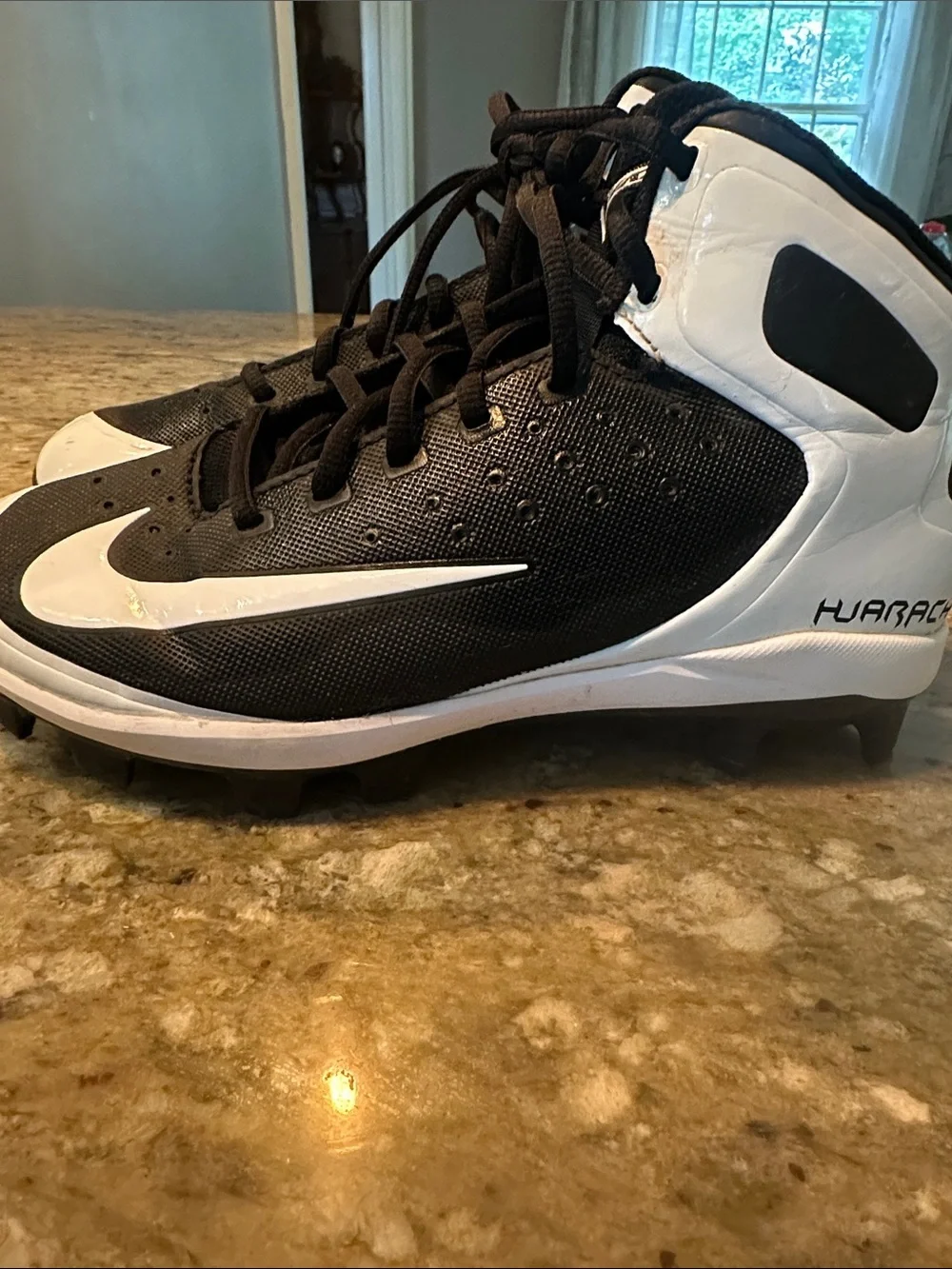 Nike Big Kids Alpha Huarache Black and White High-Top Baseball Cleats